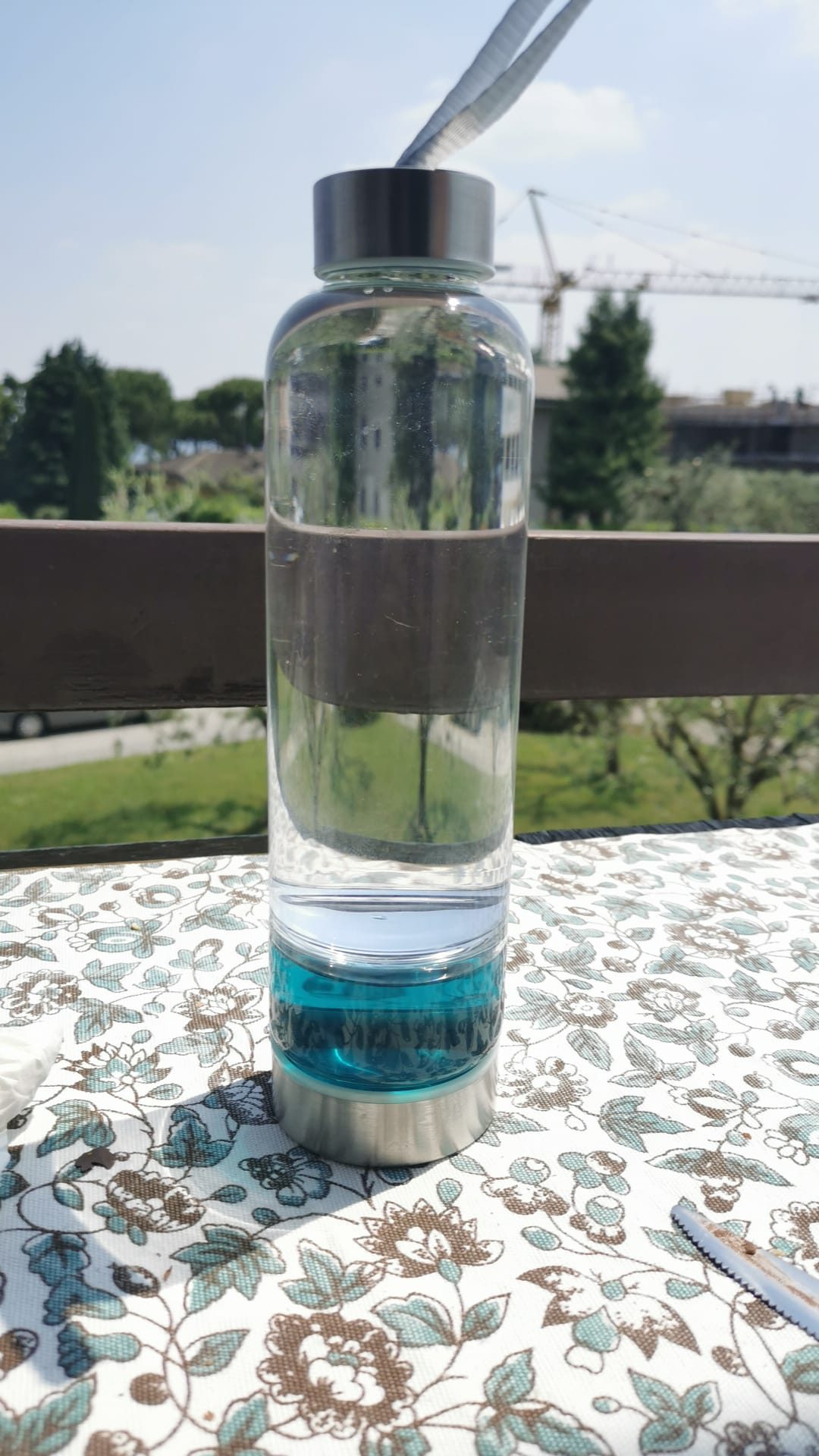 Two-chamber bottle — water and liquid magnets, side by side